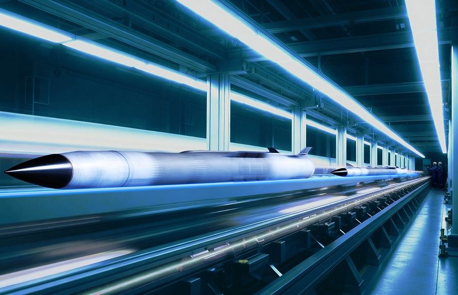 Team of three people working in a command environment