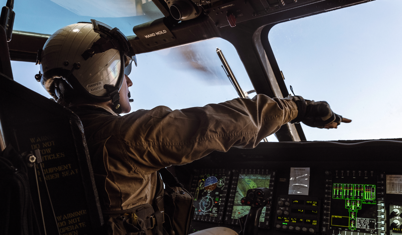 A U.S. Marine Corps pilot operates a CH-53K King Stallion over the Chocolate Mountain Aerial Gunnery Range during a training exercise in California. Photo by the U.S. Marine Corps. 