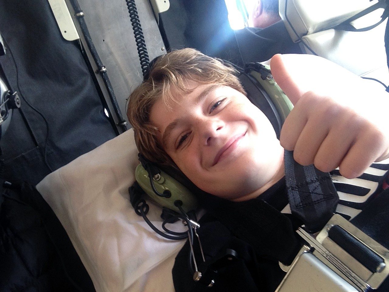 Max puts on a smile during his S-76 helicopter ride from Orange County to Children’s Hospital Los Angeles, where he was treated for a blood infection. Photo provided.